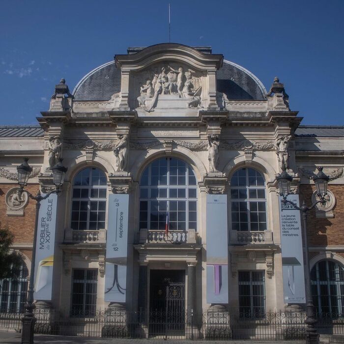 The Galerie des Gobelins with the exhibition banners