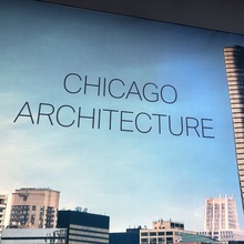 <cite>Story of Chicago</cite> exhibit and signs at Willis Tower
