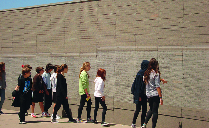 Memorial wall with the names of victims of the state terror