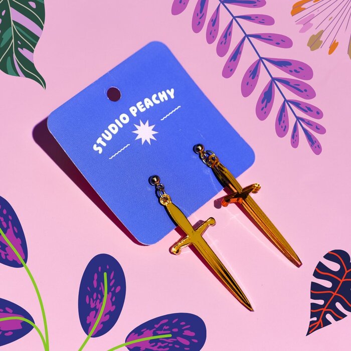 Ohno Softie Bold used on a header card for acrylic “double dagger” earrings.