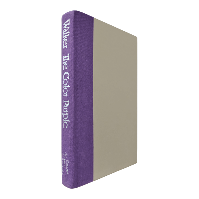 The purple spine of the hardcover also features text set in Rialto.