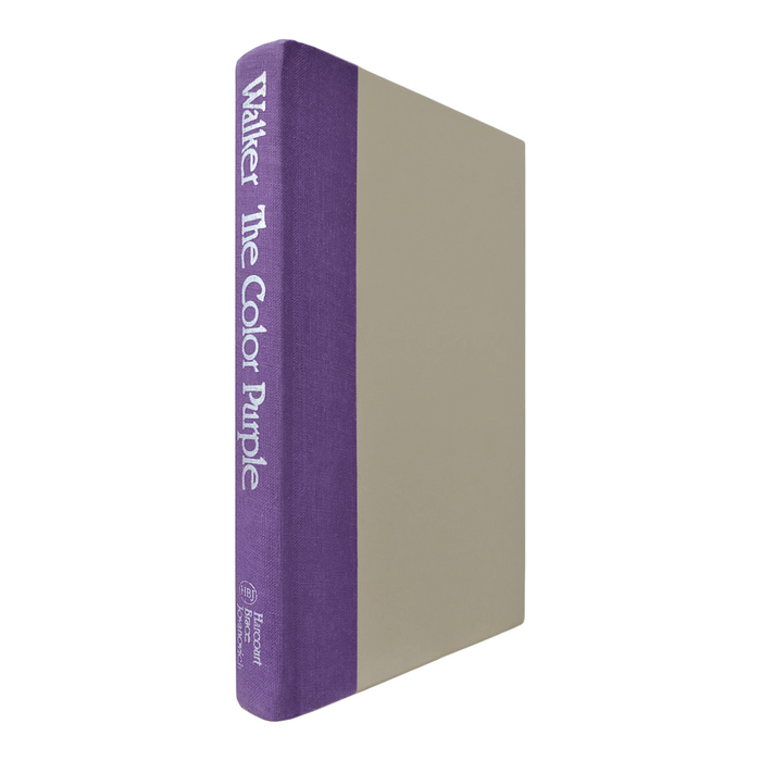 The purple spine of the hardcover also features text set in Rialto.