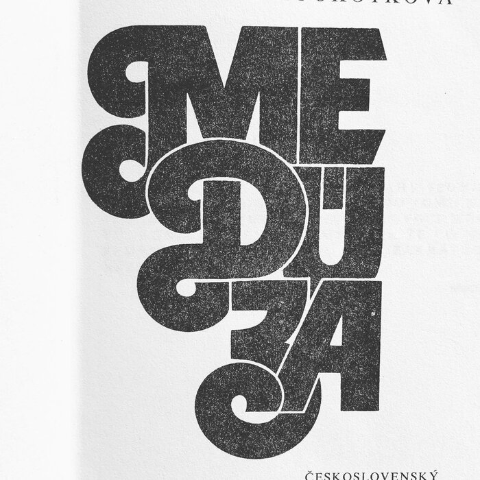 The title lockup with the tightly spaced and overlayered glyphs from Embrionic is repeated on the title page.