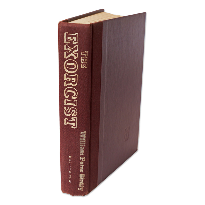 The maroon cloth spine of the hardcover features gilt lettering set in Beton Open for the title, with additional text set in Beton and Electra.