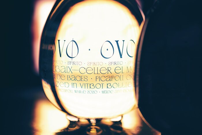 Transparent bottle, light composition close up