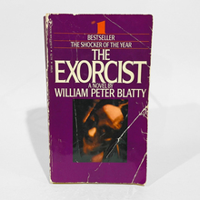 <cite>The Exorcist</cite> by William Peter Blatty (Bantam Books paperback)