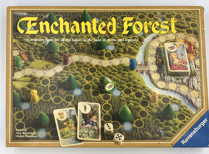 Box design for Enchanted Forest, with solidified Cathedral in yellow, featuring its alternate swash E. “A treasure hunt for all the family in the land of myths and legends” is added in  Bold.