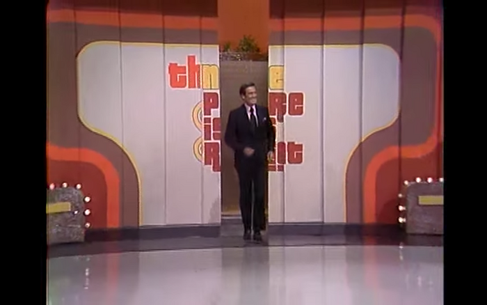 The host enters the stage.