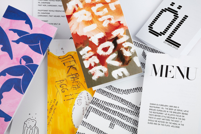 The brewery's branding used in various print applications