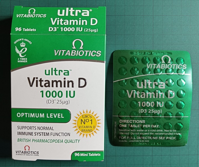 Box front and used pill cassette