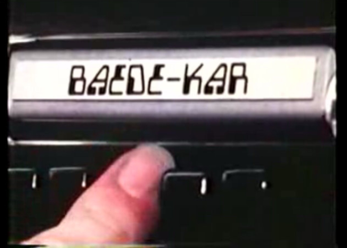 Reyner Banham inserts the Baede-Kar tape into his car’s audio system