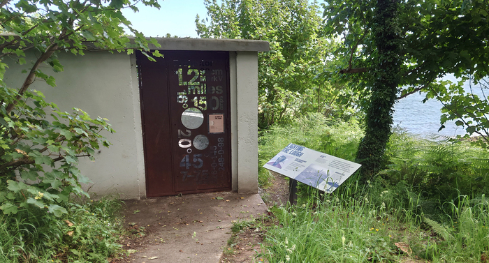 The metal door features text in .