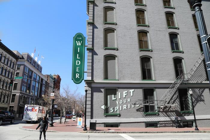 Exterior hotel mural and sign