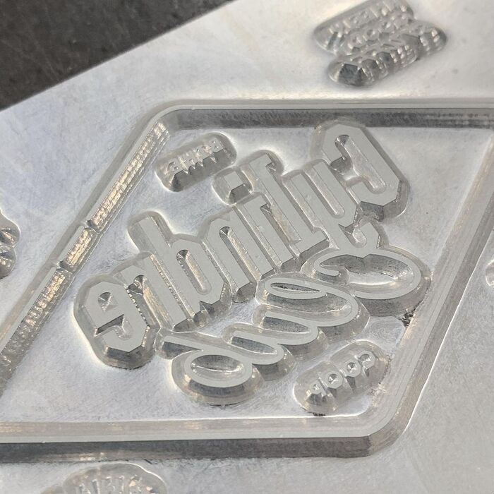 The Cylindre Club logo is getting ready for hot foil stamping, handled by Letterpress de Paris.