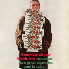 “This Christmas give cartons of Luckies” ad