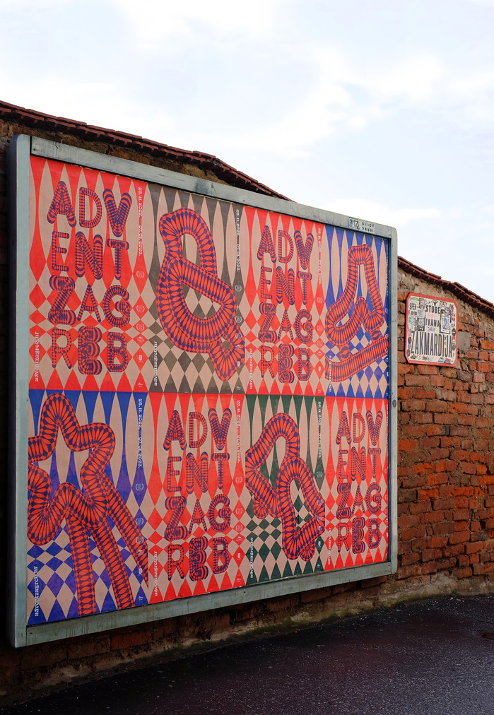Poster wall including four custom made symbols created by đkć design studio