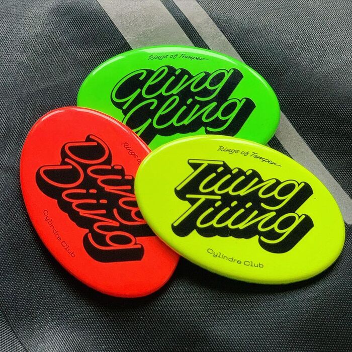“Rings of Temper” badges, printed in neon colors by h2impression.fr (8 km), featuring Superette Shaded