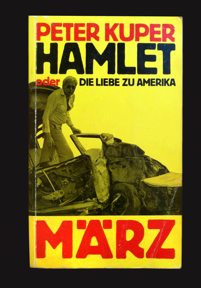 Hamlet oder die Liebe zu Amerika by Peter Kuper, 5th edition, 1982. This paperback cover uses a wide E and a narrow T in the title, as well as a K with curved arm in the author’s name. The dust jacket of the hardback edition shown above uses different forms for these letters.