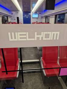 “Welkom” sign in Dutch trains