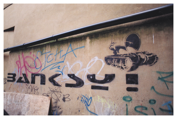 A work from 1998, featuring the artist’s trademark stencil signature which is based on Stop. The A featured in this early version of the Banksy signature more closely aligns with Stop.