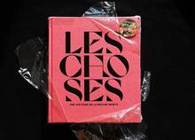 <cite>Les Choses</cite> at Louvre, exhibition catalog and merchandise