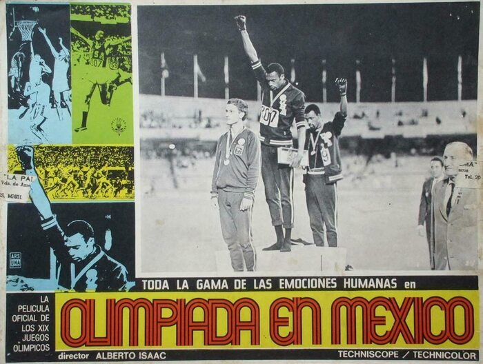 Mexican poster by Ars-Una, depicting the medal award ceremony for the men’s 200 metres race: “Black American athletes Tommie Smith (gold) and John Carlos (bronze) took a stand for civil rights by raising their black-gloved fists and wearing black socks in lieu of shoes. The Australian Peter Norman, who had run second, wore an American ‘human rights’ badge as support to them on the podium.” [Wikipedia]



The secondary typefaces are , , and  or similar.