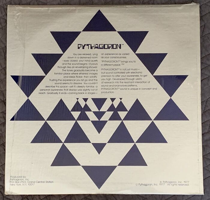 Larger image of back of album cover. Note the alternate 1’s of the X-Light weight of ITC Avant Garde Gothic in use.
