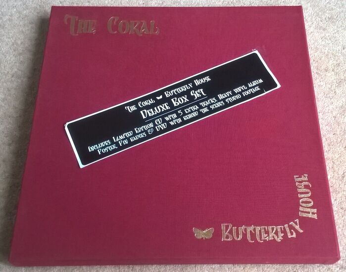 Deluxe Box Set incl. a limited edition CD with five extra tracks, a heavy vinyl album, a poster, pin badges, and a DVD with behind the scenes studio footage. [More info on Discogs]