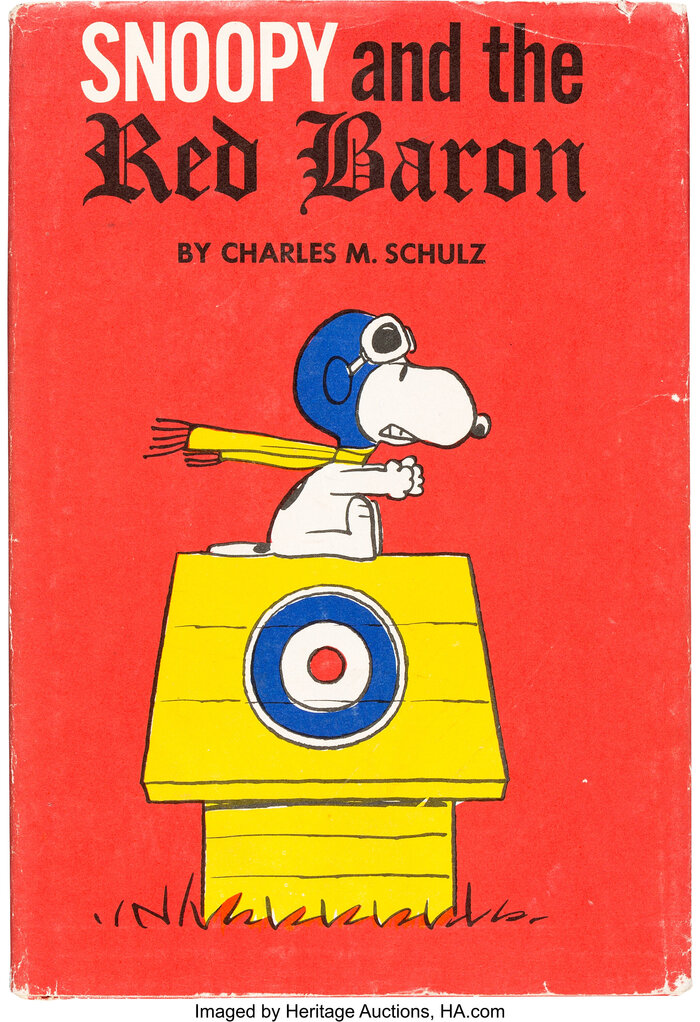 The dust jacket features  (“SNOOPY and the”),   (“Red Baron”), and  Bold for the smaller text.