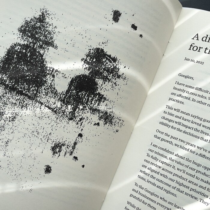 An interior spread (with the first edition’s staple binding)