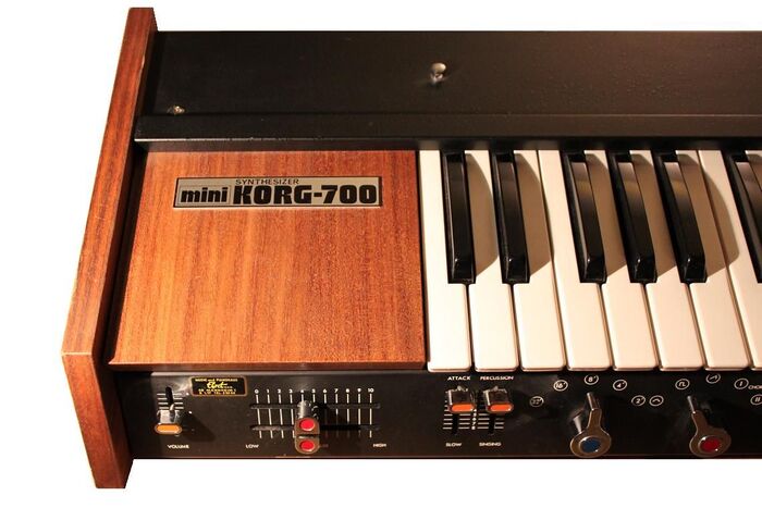 Detail of the miniKORG 700. “Synthesizer” appears to be in  or similar.