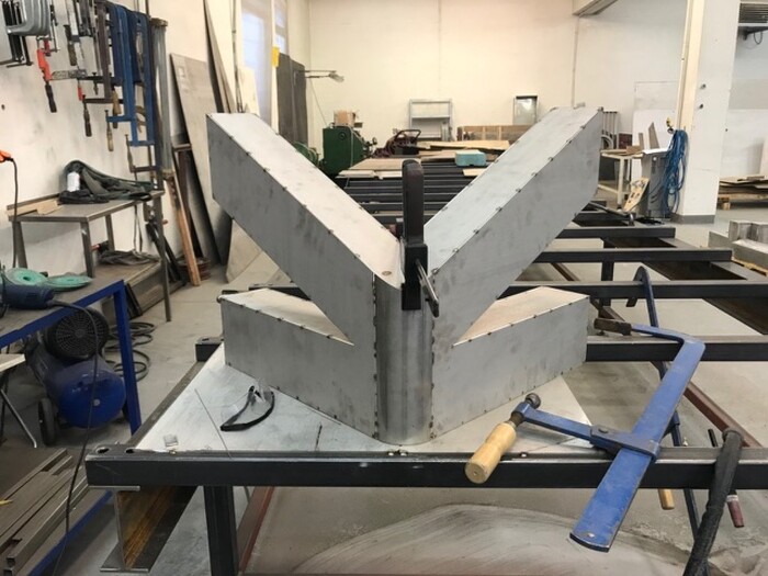 A bent letter in the making
