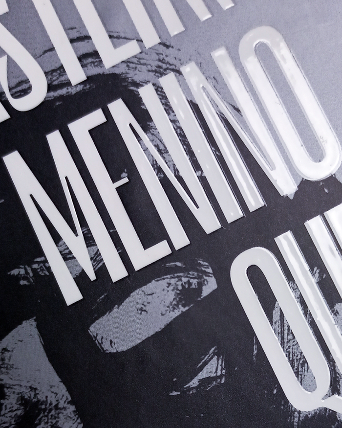 A close up of the embossed title showing the letterforms of Le Murmure with spot varnish