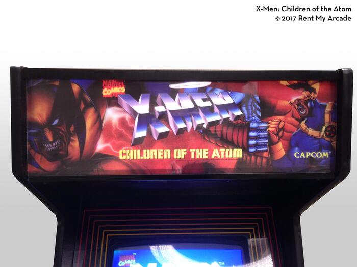 The marquee sign for the X-Men: Children of the Atom arcade cabinet