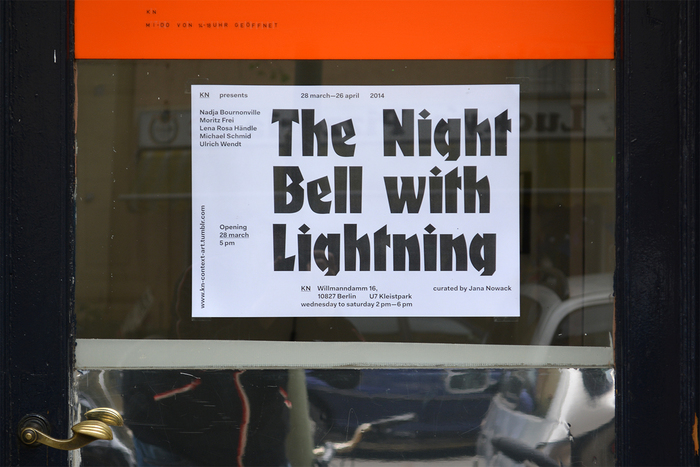 Poster for The Night Bell With Lightning in the window of KN, ft. .