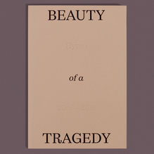 <cite>Beauty of a Tragedy</cite>