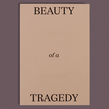 <cite>Beauty of a Tragedy</cite>