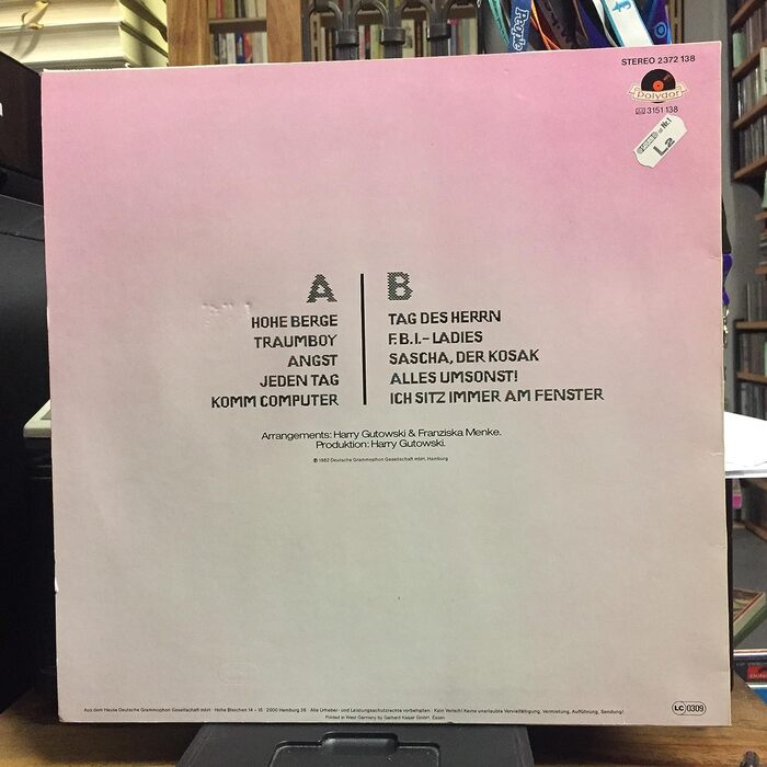 Back cover of the self-titled LP. The track list features more Helicopter.