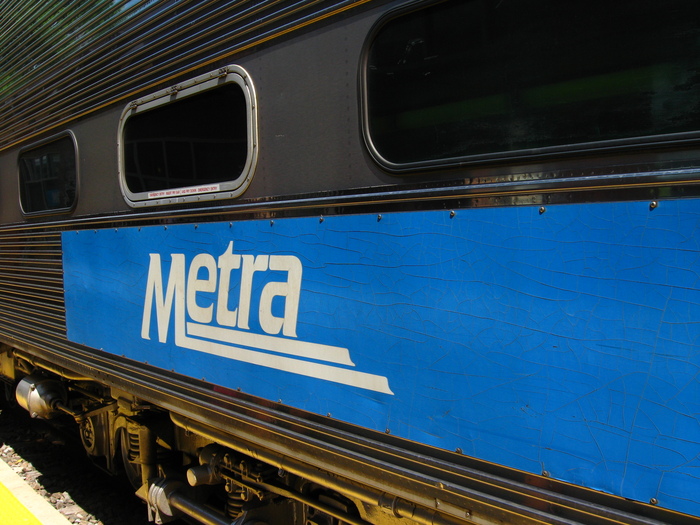The Metra logo on a train, spotted in Westmont in 2009