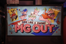 <cite>Pig Out</cite> arcade game