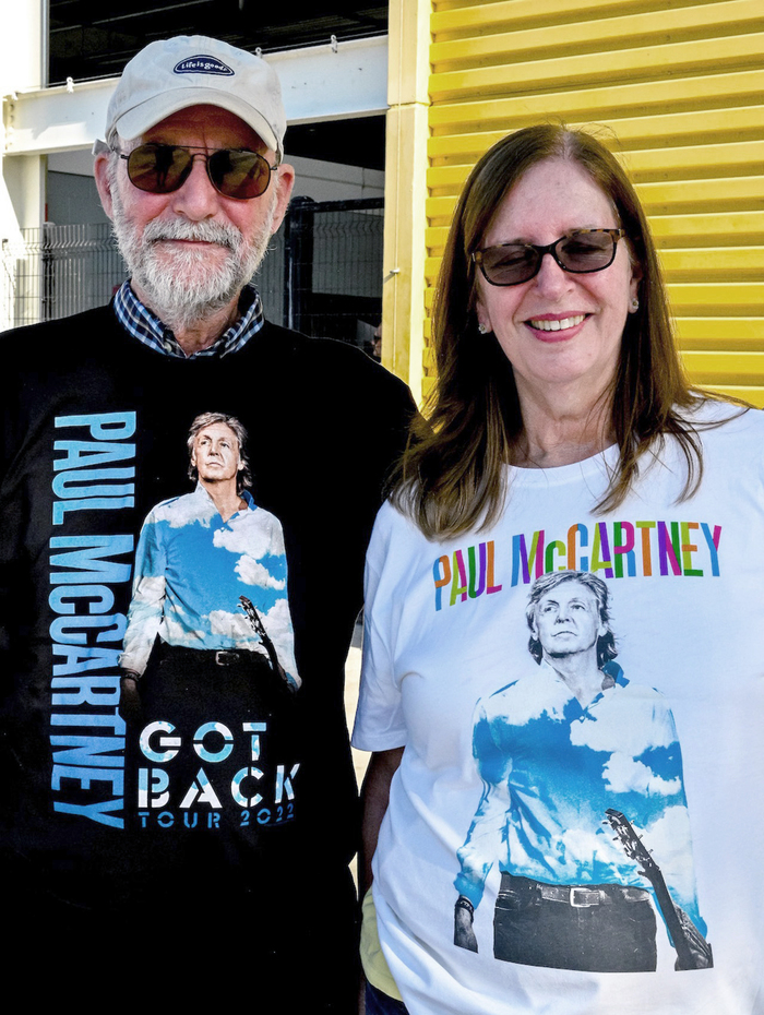 Fans wearing tour T-shirts