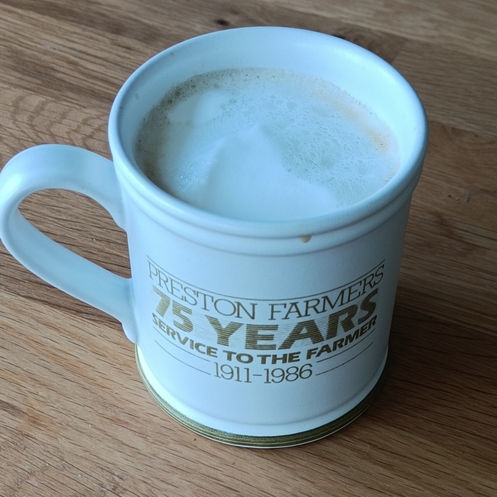 Mug of foamy coffee