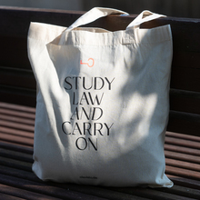 “Study Law and Carry On” bag by Clavisto