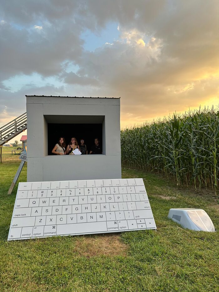 A giant computer complete with keyboard and mouse stands next to the eastern edge of the maze.