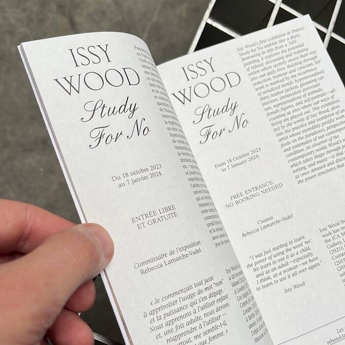 The booklet text seems to be set in  Italic.