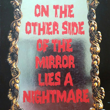 <cite>Mirror</cite> by Graham Masterton, Sphere
