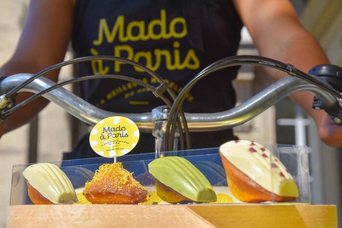 Mado &agrave; Paris logo on a pastry label and the shirt of a mobile vendor