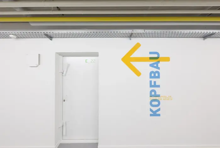  by  – which is also used for the main sign at the entrance