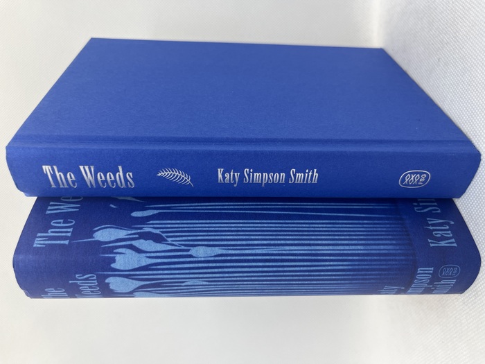 Book jacket; book cover and spine with silver foil stamping