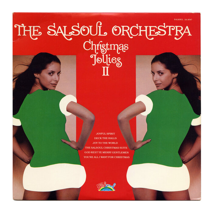 In 1981, a second volume followed. Christmas Jollies II has a red cover and a second mirrored woman.